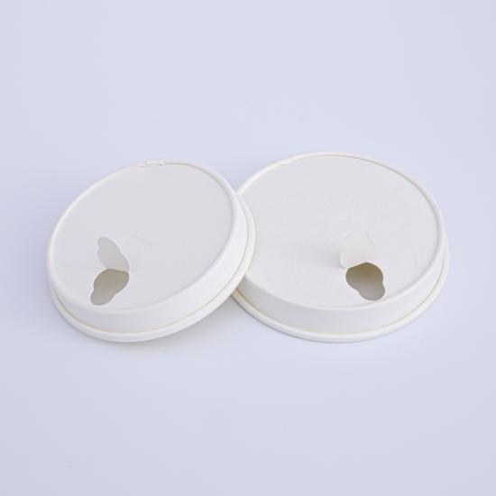 White paper coffee cup lids